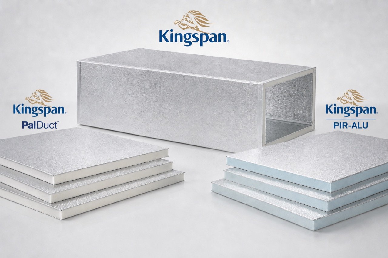 A formed Kingspan pre-insulated duct section between stacks of PalDuct (white core) and PIR-ALU (blue core) panels.
